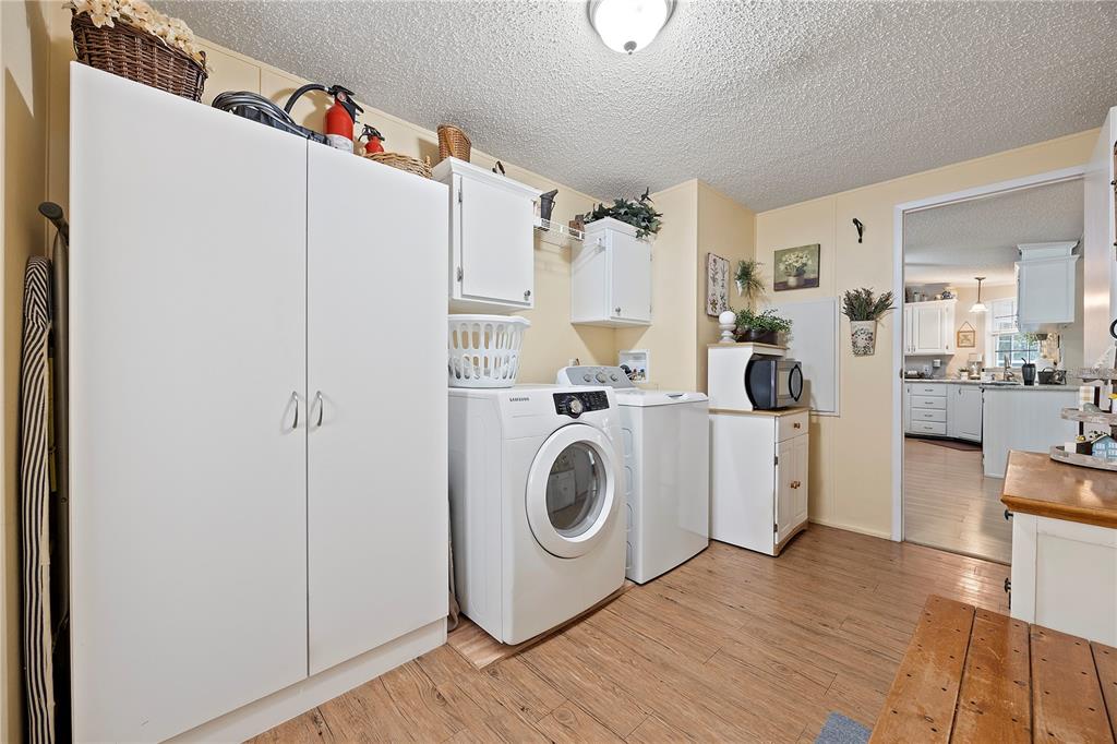 159 Southwest 70th Avenue Bell, FL 32619 - Photo 20 of 42 a utility room with dryer and washer