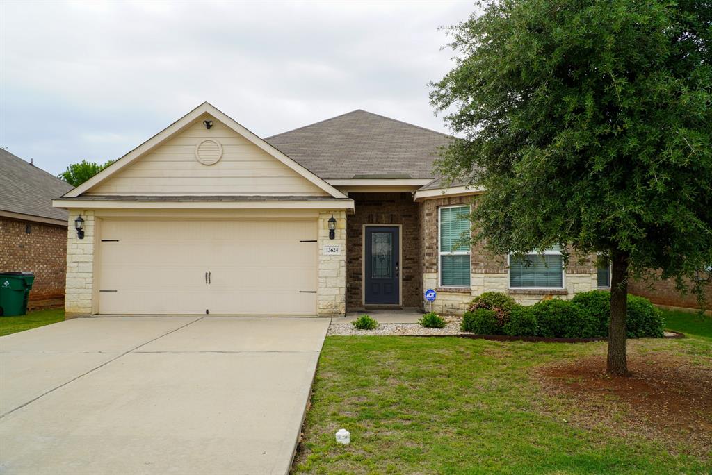 13624 Helix Bridge Way Crowley, TX 76036 - Photo 1 of 25 a view of a house with backyard and garden