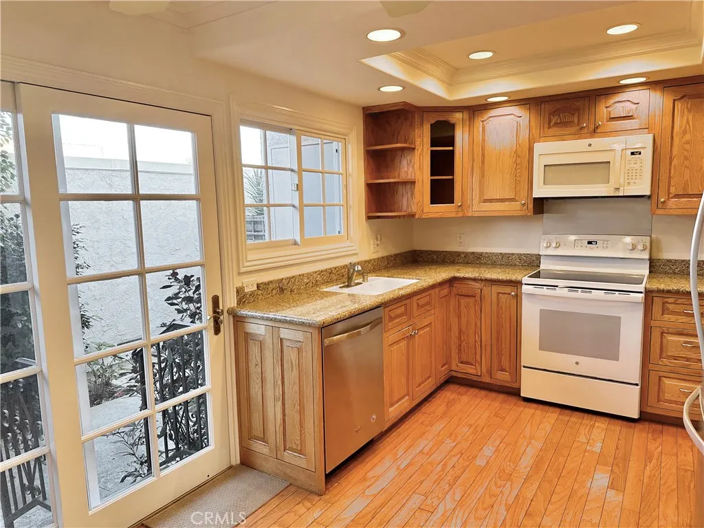 28005 Ridgebluff Court Rancho Palos Verdes, CA 90275 - Photo 3 of 30 a kitchen with stainless steel appliances granite countertop a stove and a sink
