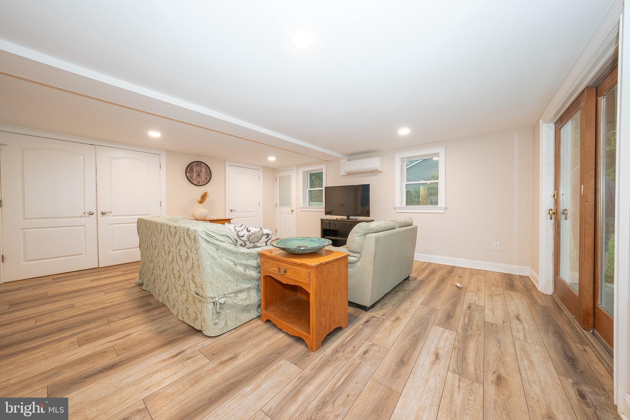 950 Spring City Road Phoenixville, PA 19460 - Photo 23 of 43 a living room with furniture and a wooden floor