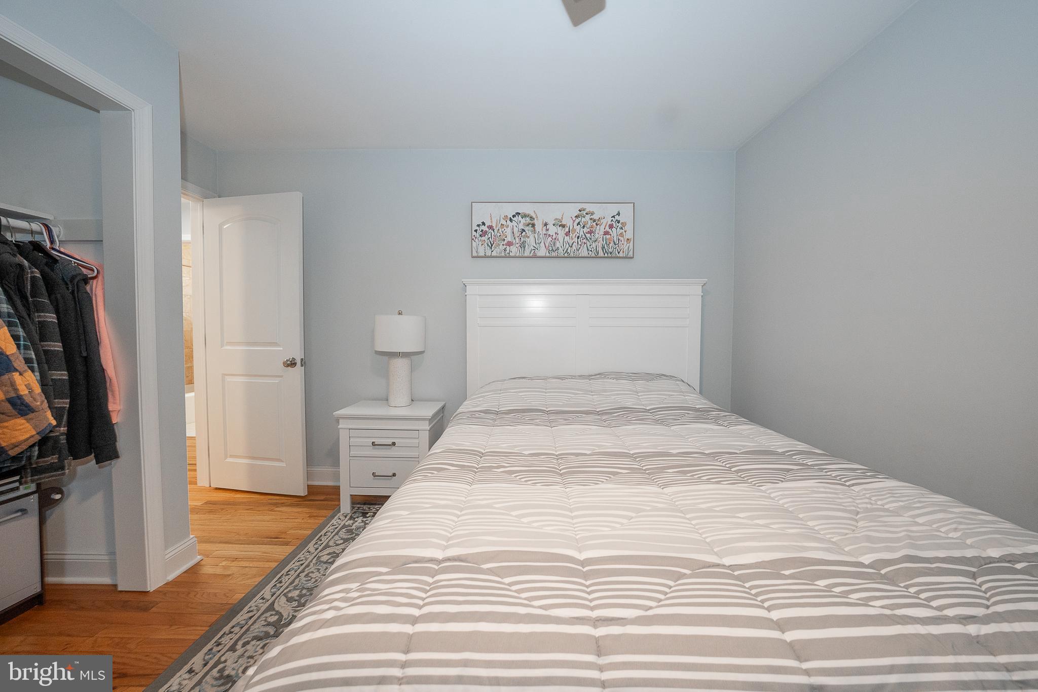 950 Spring City Road Phoenixville, PA 19460 - Photo 31 of 43 a bedroom with a bed and a flat screen tv