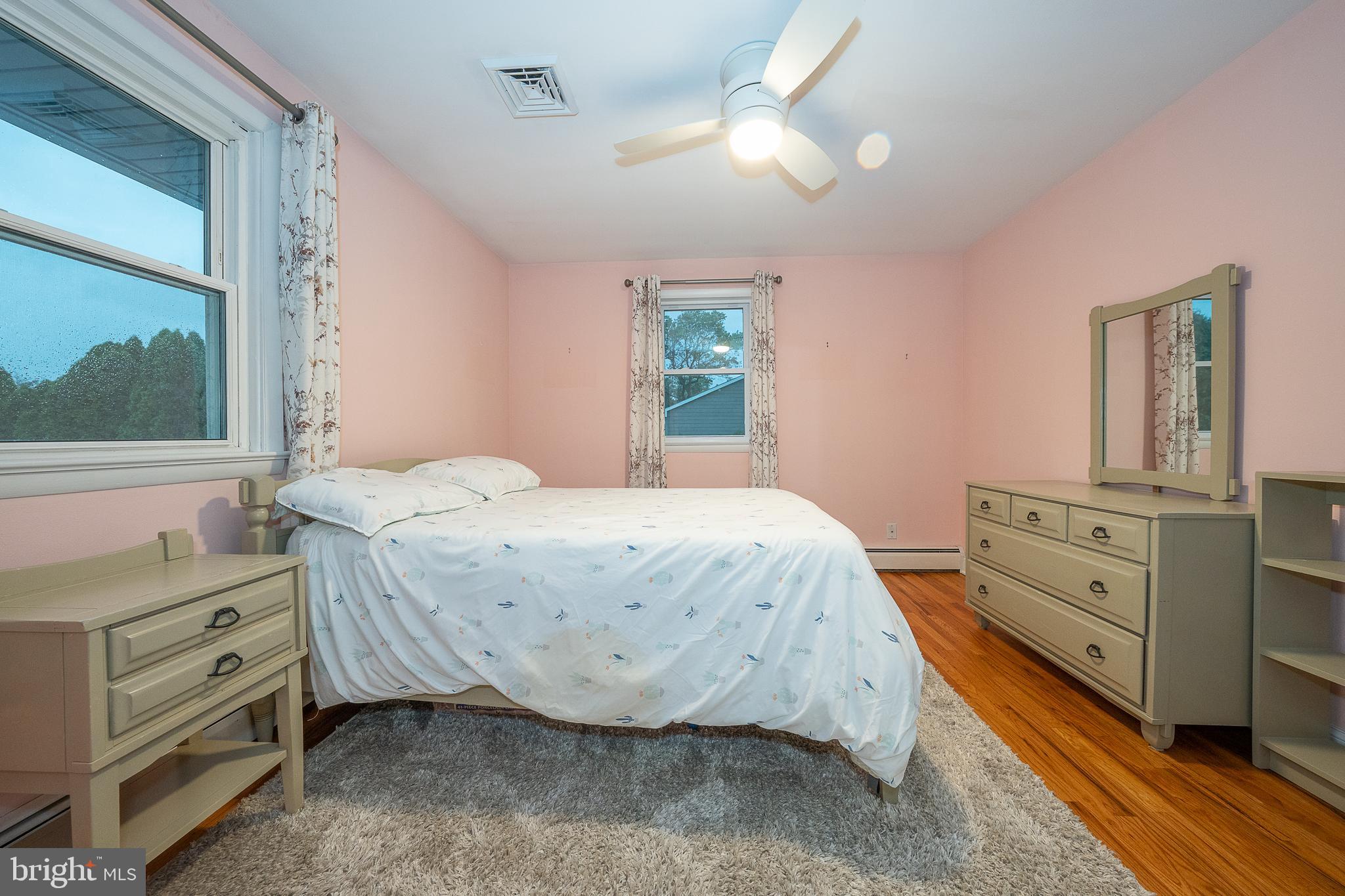 950 Spring City Road Phoenixville, PA 19460 - Photo 35 of 43 a bedroom with a bed and a dresser