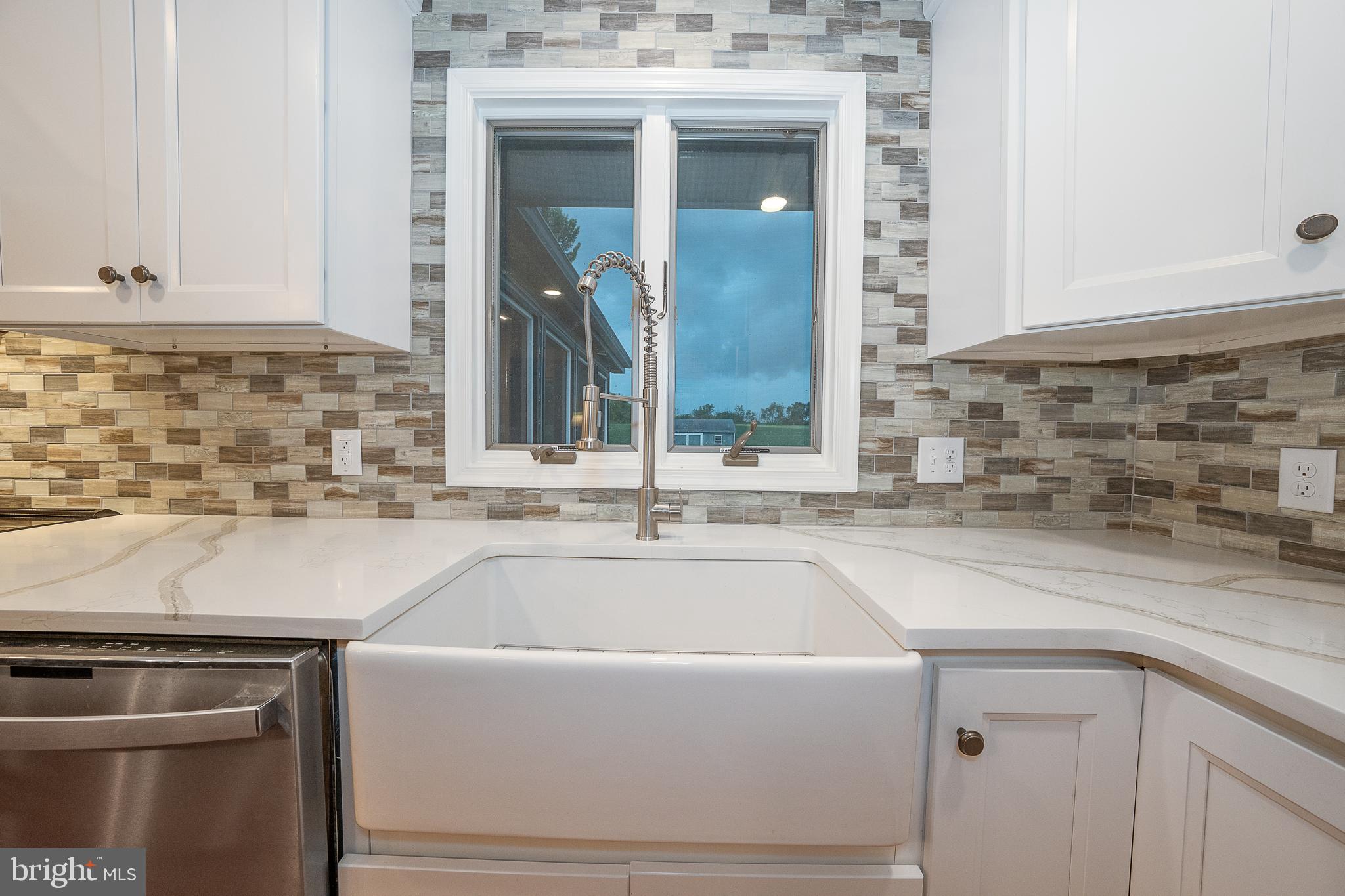 950 Spring City Road Phoenixville, PA 19460 - Photo 4 of 43 a bathroom with a sink and a mirror