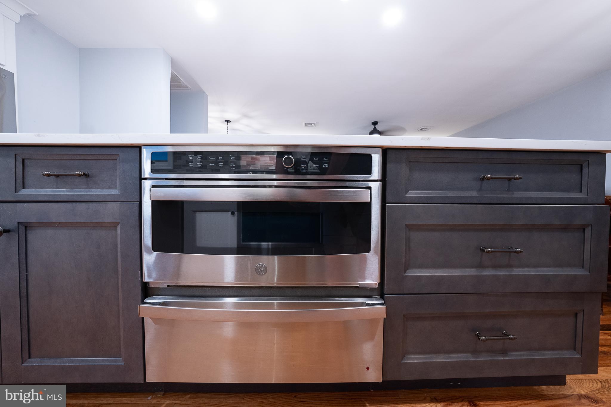 950 Spring City Road Phoenixville, PA 19460 - Photo 6 of 43 a stove top oven sitting inside of a kitchen