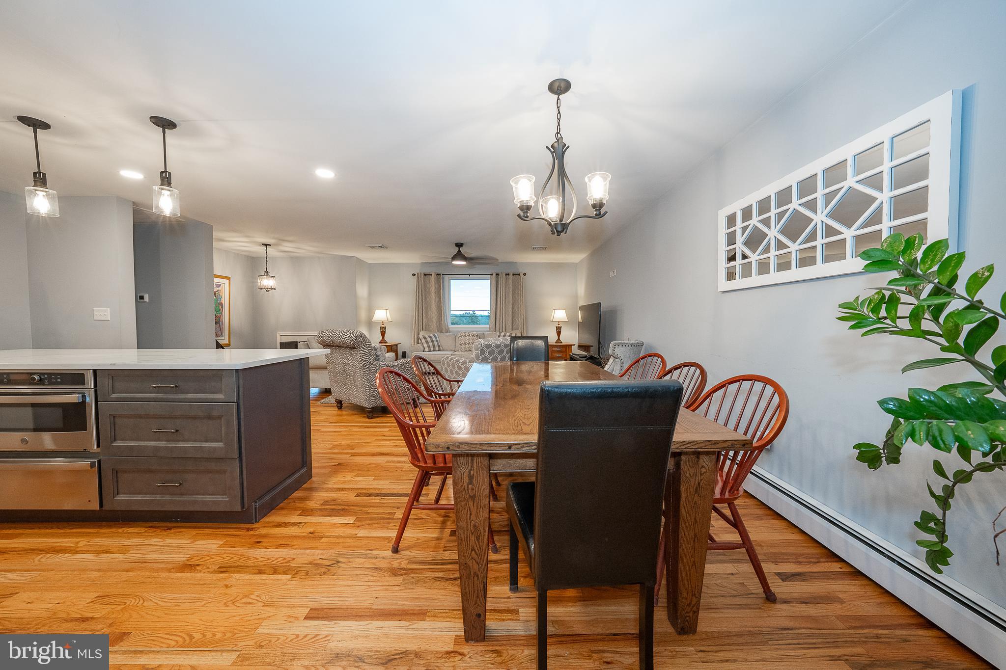 950 Spring City Road Phoenixville, PA 19460 - Photo 7 of 43 a view of a dining room with furniture and wooden floor