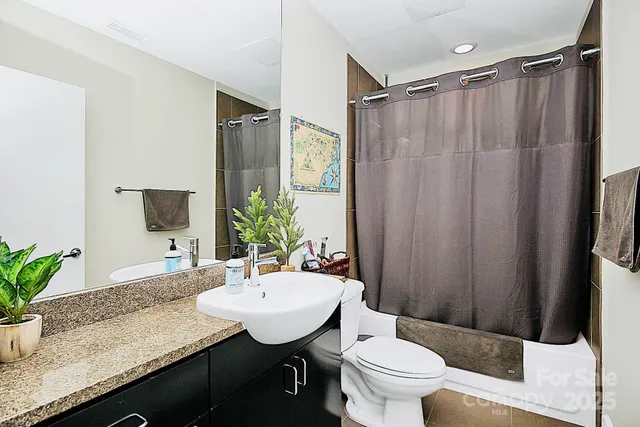 a view of a city with tall buildings