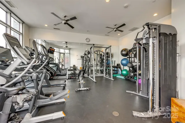 an outdoor space with patio furniture and potted plants