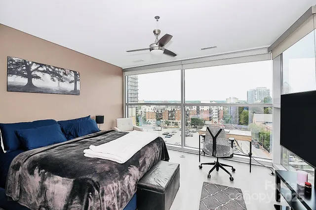 a bathroom with a tub a sink and a mirror
