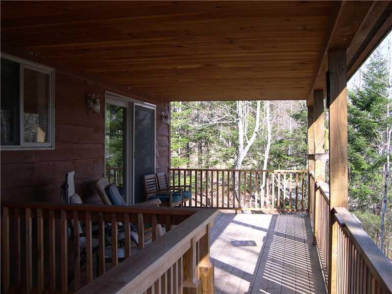 129 2 Rod Road Rangeley, ME 04970 - Photo 7 of 26 Patio/Deck. Entry onto covered porch