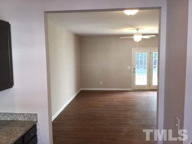 844 Horton Road, Unit 53 Durham, NC 27704 - Photo 3 of 10 a view of a room with wooden floor and staircase