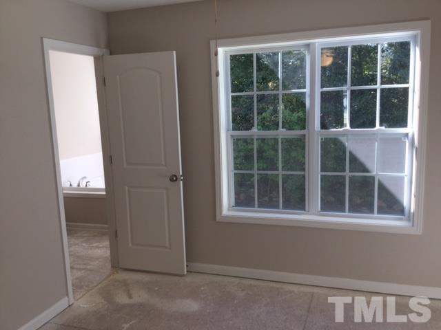 844 Horton Road, Unit 53 Durham, NC 27704 - Photo 5 of 10 a view of empty room with windows