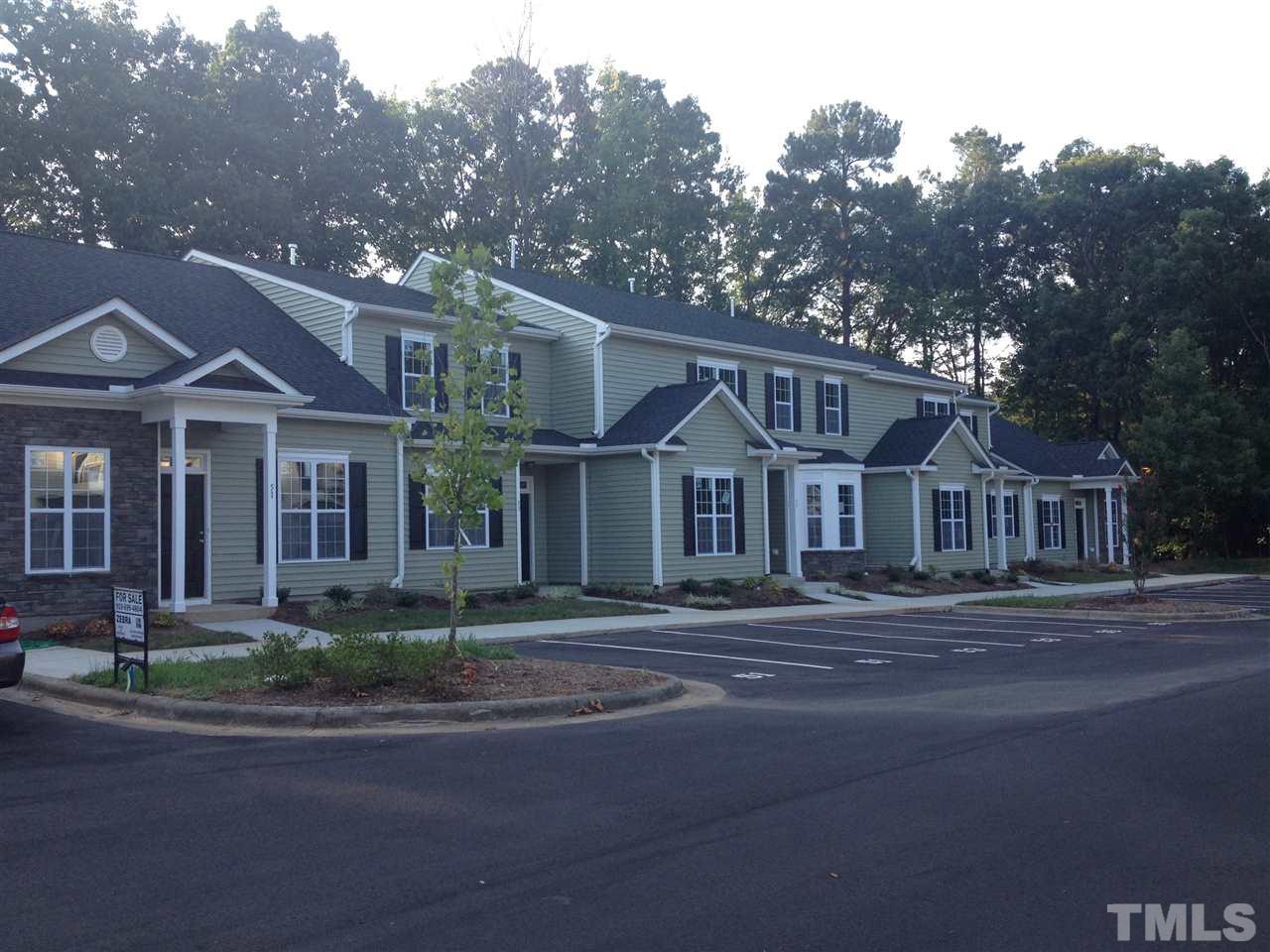 844 Horton Road, Unit 53 Durham, NC 27704 - Photo 10 of 10 a front view of a house with a garden