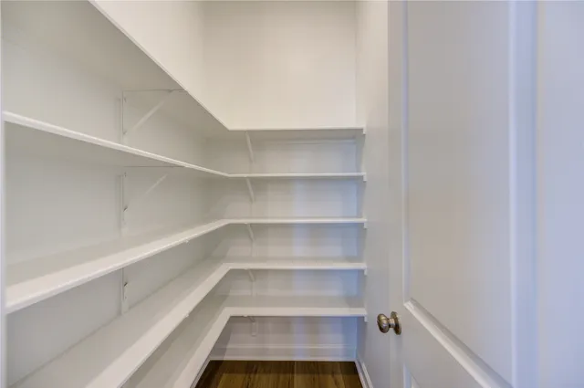 a view of a room with shelves