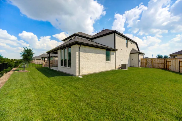 a house view with a garden space