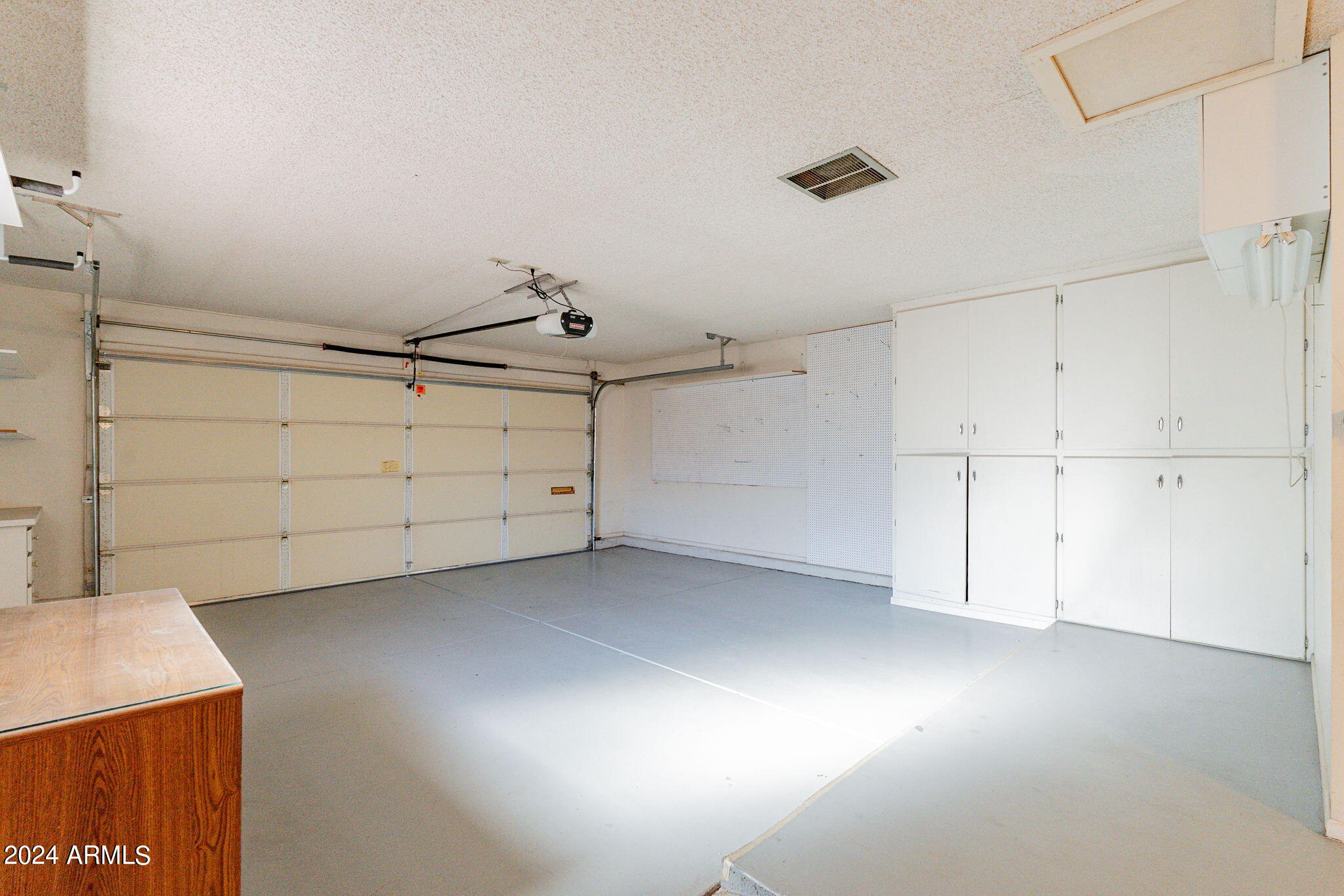 9510 West Greenway Road Sun City, AZ 85351 - Photo 22 of 46 a view of a garage