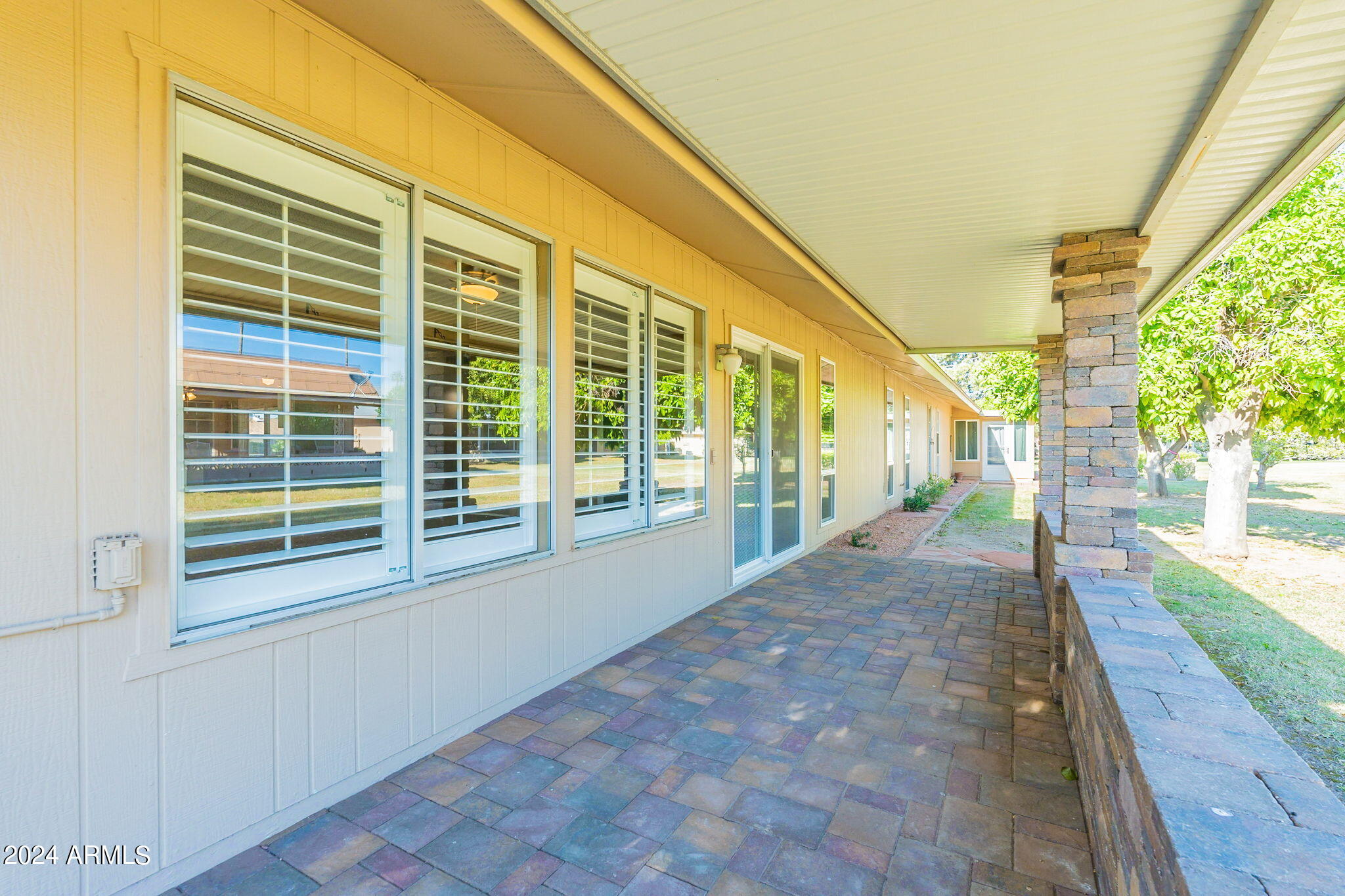 9510 West Greenway Road Sun City, AZ 85351 - Photo 30 of 46 a view of porch with a porch