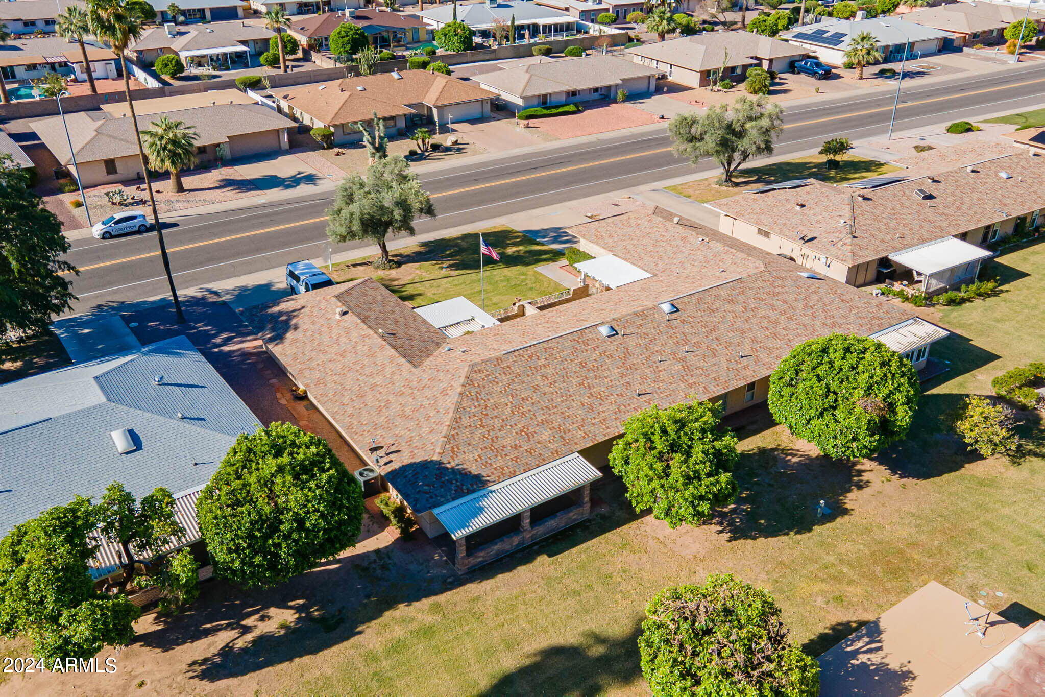 9510 West Greenway Road Sun City, AZ 85351 - Photo 33 of 46 an aerial view of a house with a yard basket ball court and outdoor seating