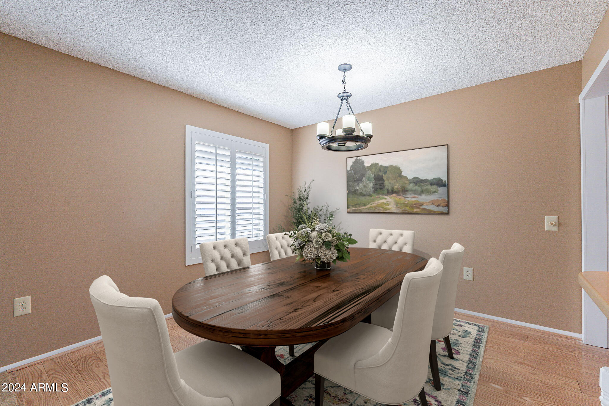 9510 West Greenway Road Sun City, AZ 85351 - Photo 8 of 46 a view of a dining room with furniture window and wooden floor
