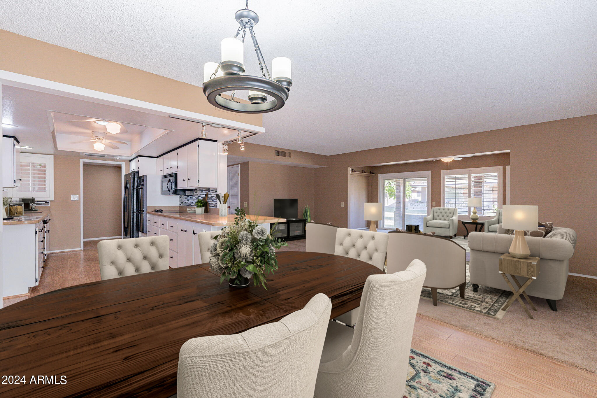9510 West Greenway Road Sun City, AZ 85351 - Photo 46 of 46 a view of a dining room with furniture and chandelier