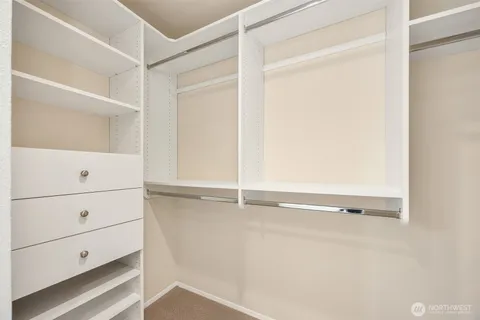 a view of an empty walk in closet