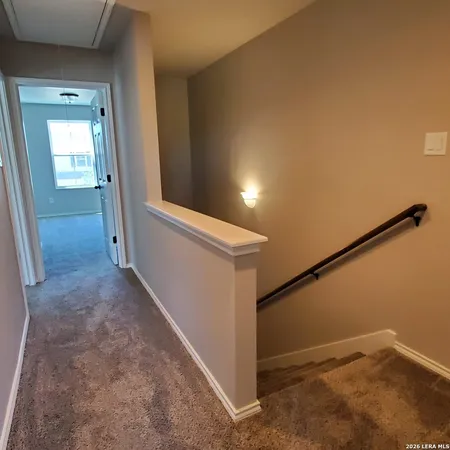 view of a hallway with closet