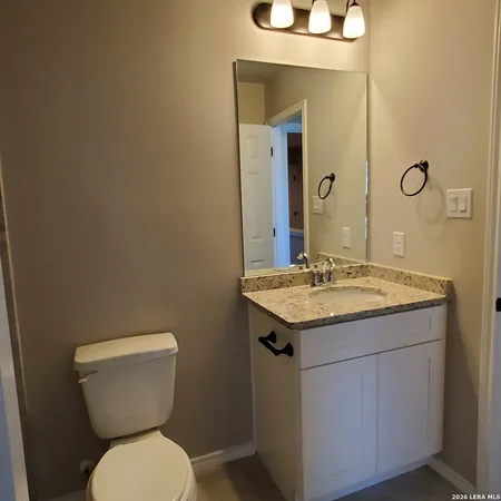 a view of a backyard with sitting area