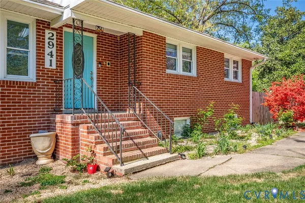 a bathroom with a sink toilet and mirror