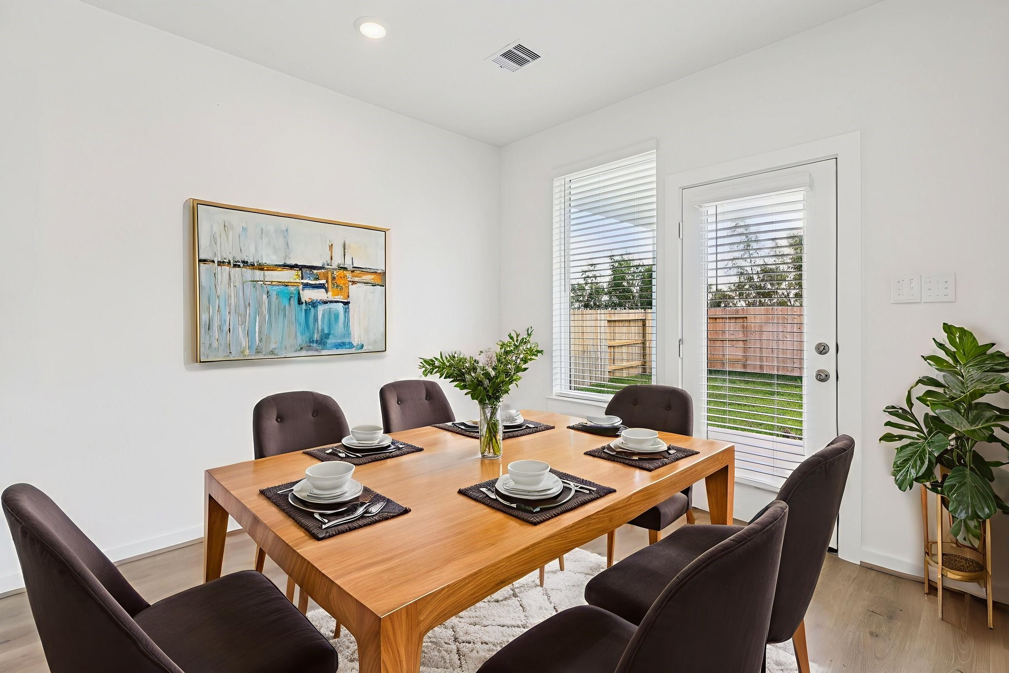 5815 Chamberlain Crossing Rosenberg, TX 77471 - Photo 7 of 35 a view of a dining room with furniture window and wooden floor