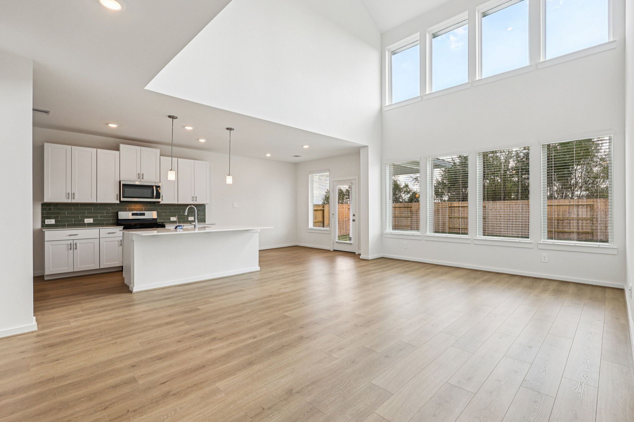 5815 Chamberlain Crossing Rosenberg, TX 77471 - Photo 8 of 35 a view of kitchen with cabinets and wooden floor