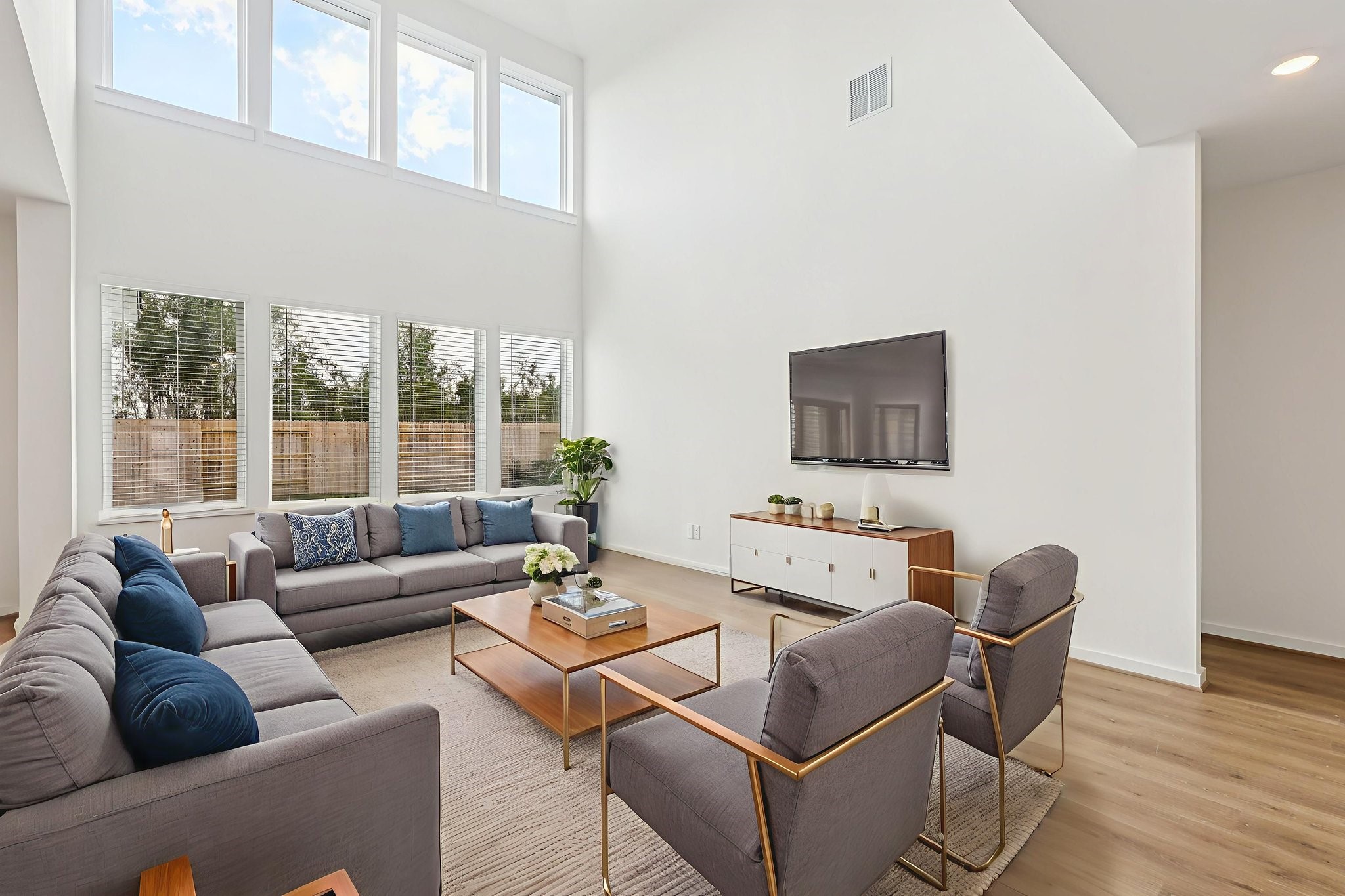 5815 Chamberlain Crossing Rosenberg, TX 77471 - Photo 10 of 35 a living room with furniture and a large window