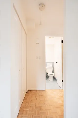 a bathroom with a toilet a sink and a bathtub