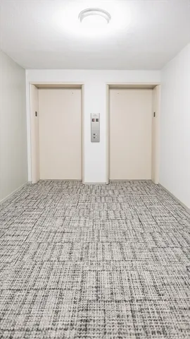 a view of a livingroom with wooden floor