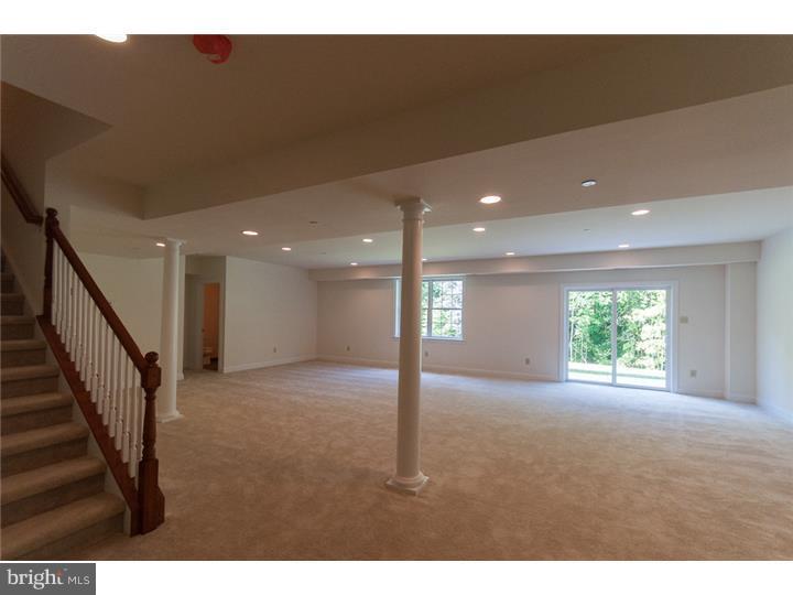 117 North Hillcrest Road Springfield, PA 19064 - Photo 13 of 17 a view of an empty room with wooden floor