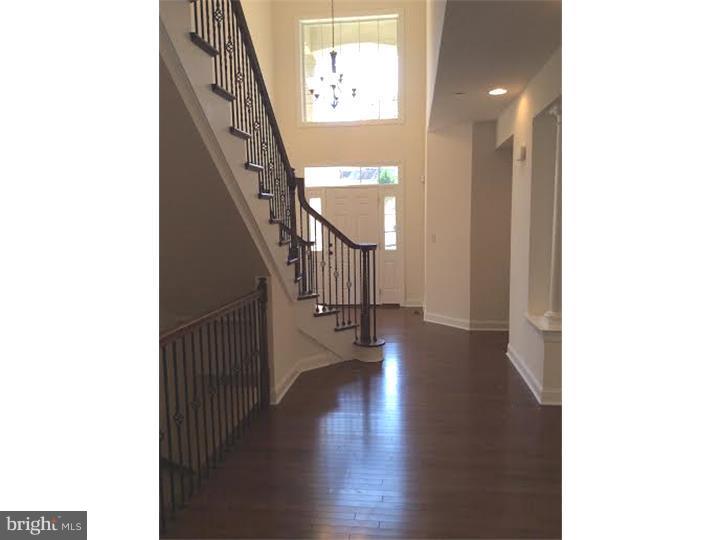 117 North Hillcrest Road Springfield, PA 19064 - Photo 17 of 17 a view of a hallway with wooden floor