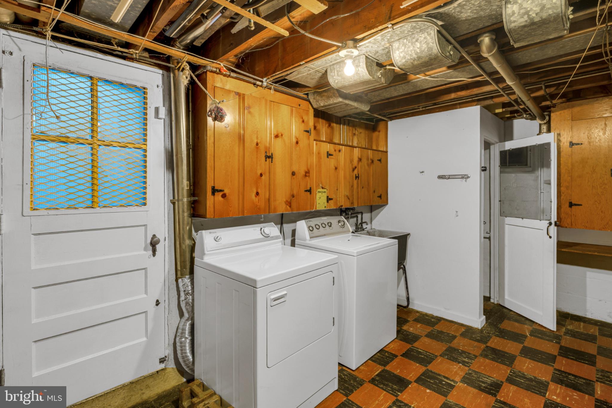 4513 Rokeby Road Baltimore, MD 21229 - Photo 28 of 38 Laundry area and lower level exit