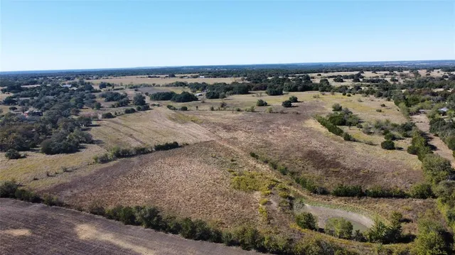 a aerial view of a backyard of a house