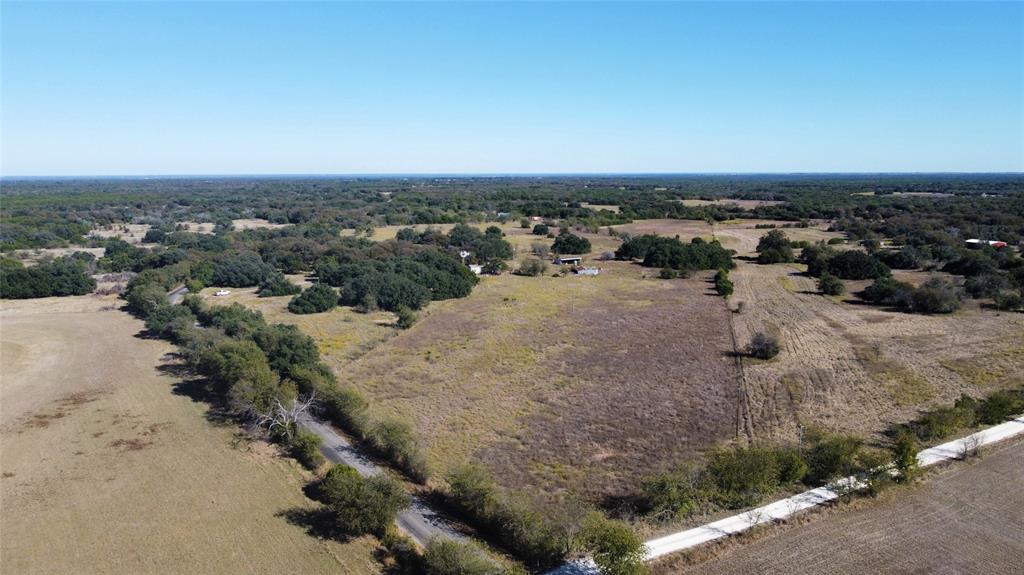 1383 County Road 1110 Meridian, TX 76665 - Photo 9 of 16 an aerial view of a houses with a yard