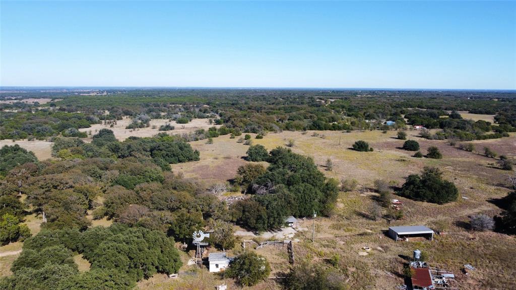 1383 County Road 1110 Meridian, TX 76665 - Photo 10 of 16 an aerial view of a city with lots of residential buildings