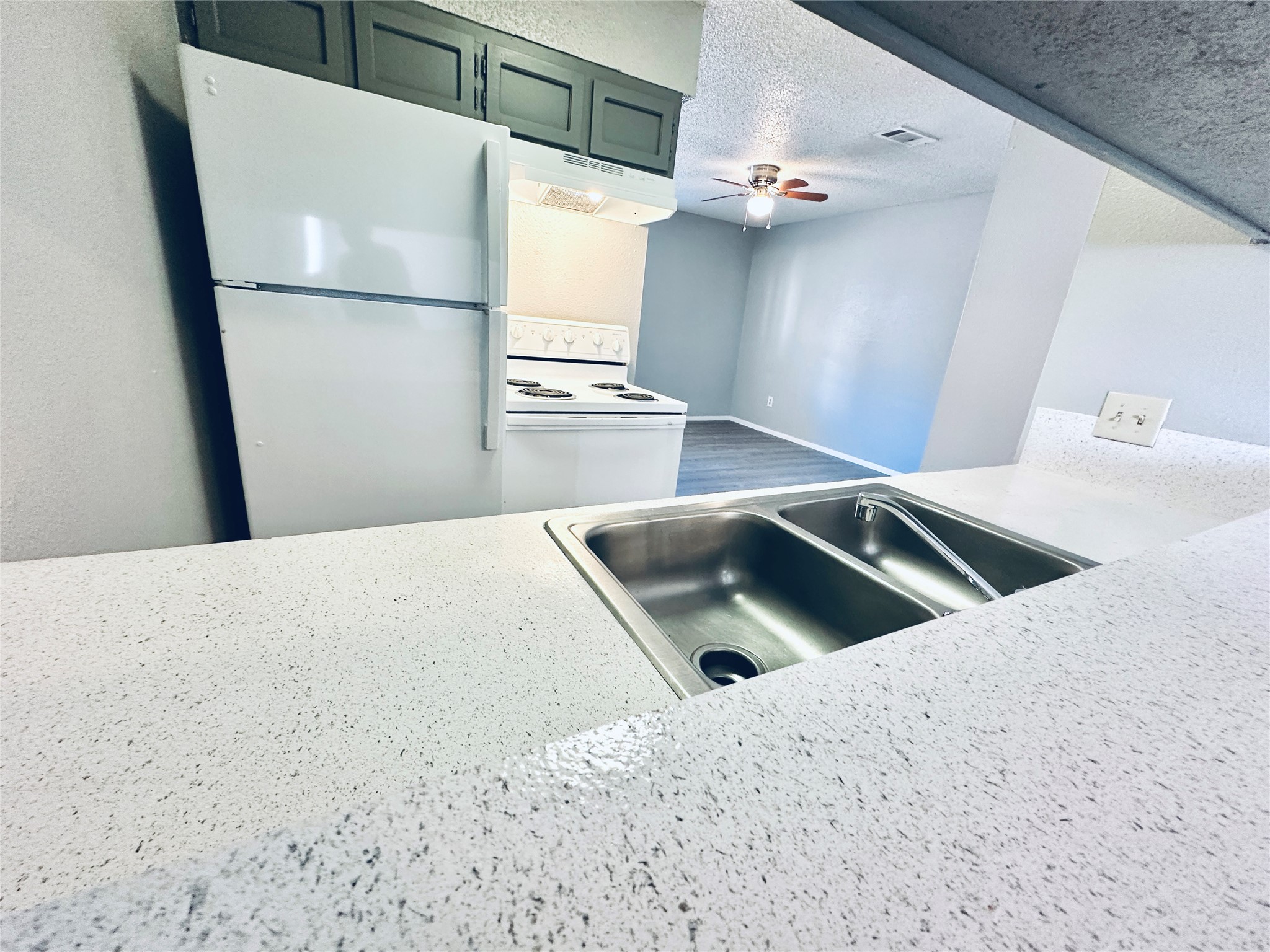 3702 South 2nd Street, Unit 103 Austin, TX 78704 - Photo 4 of 12 a view of kitchen and empty room