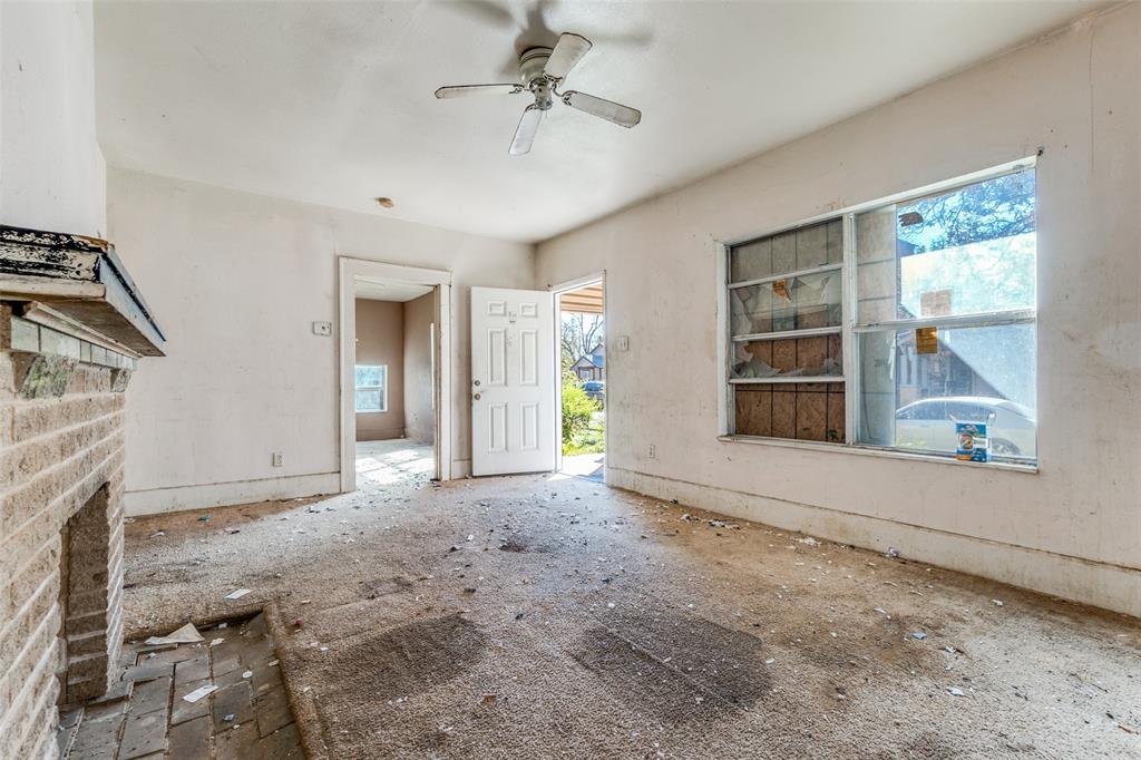 3914 Spence Street Dallas, TX 75215 - Photo 7 of 14 a view of an empty room with a window
