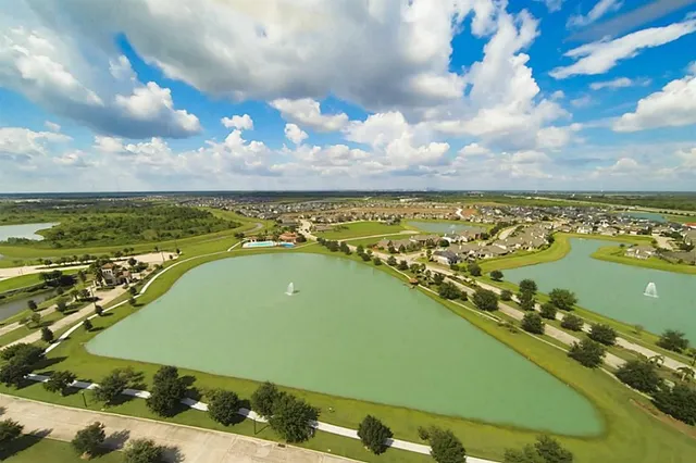 a view of a swimming pool with an ocean view
