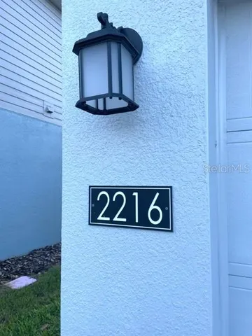 a view of a door with a wall