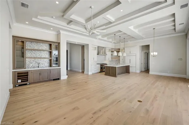 a view of a kitchen with furniture and window