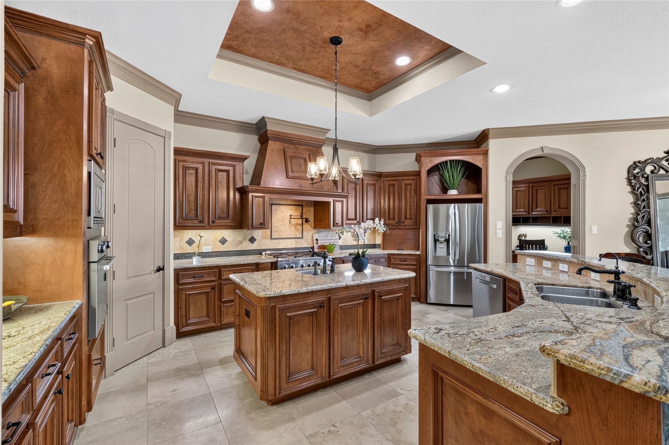 26 Post Shadow Estate Drive Spring, TX 77389 - Photo 18 of 49 All the details you would want in a kitchen like a prep sink and pot filler.