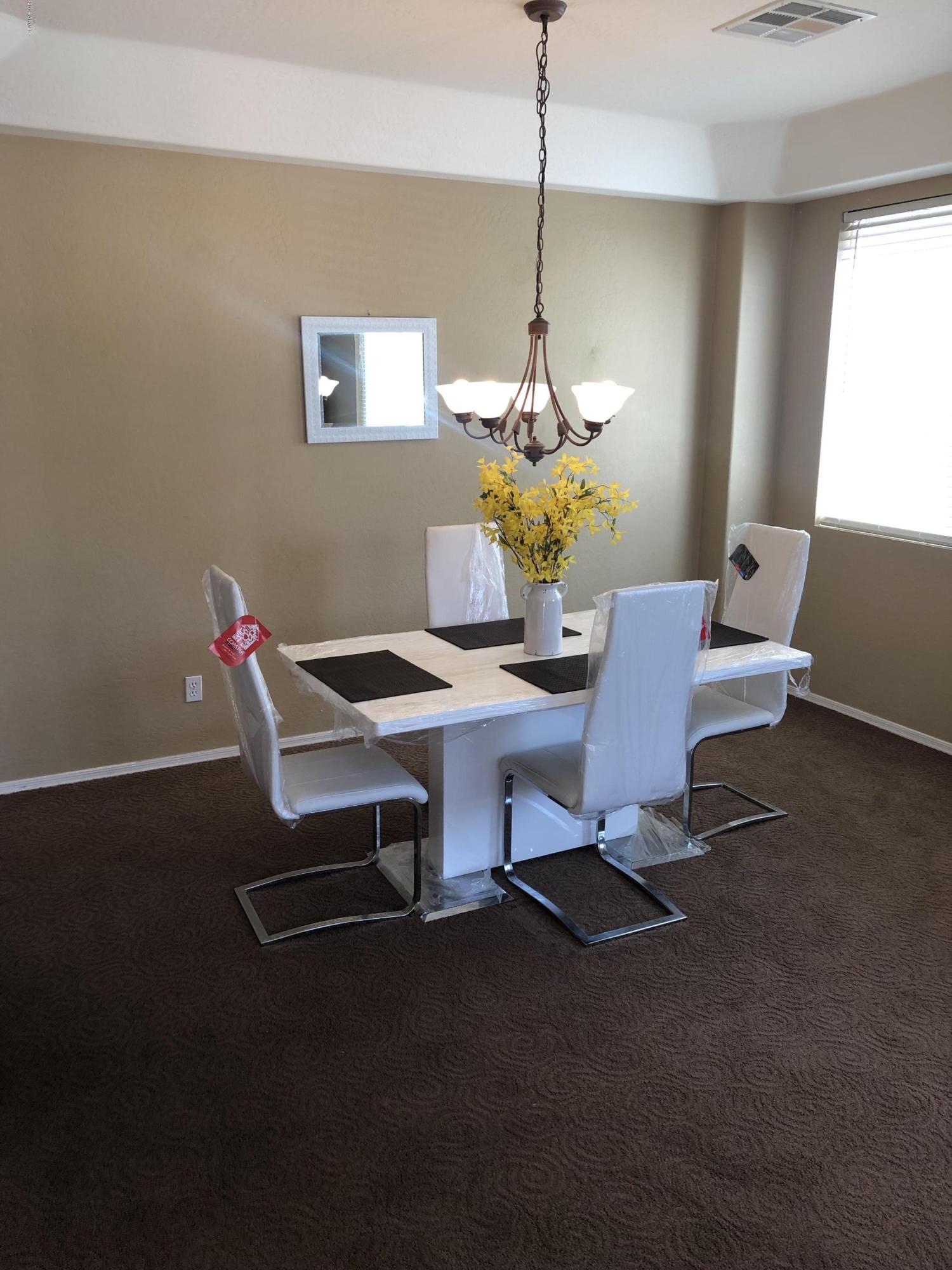 14976 West Wethersfield Road Surprise, AZ 85379 - Photo 4 of 32 4