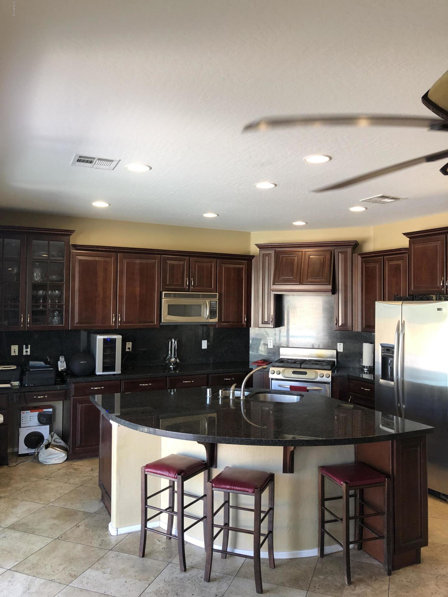 14976 West Wethersfield Road Surprise, AZ 85379 - Photo 9 of 32 9