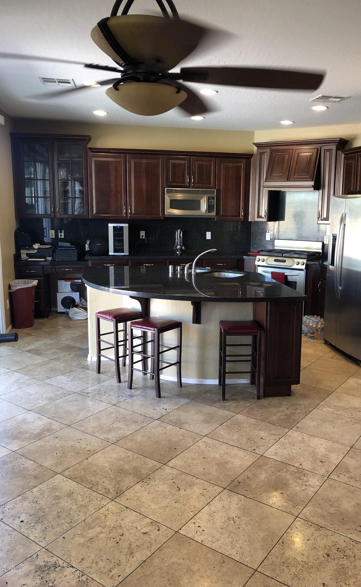 14976 West Wethersfield Road Surprise, AZ 85379 - Photo 10 of 32 10
