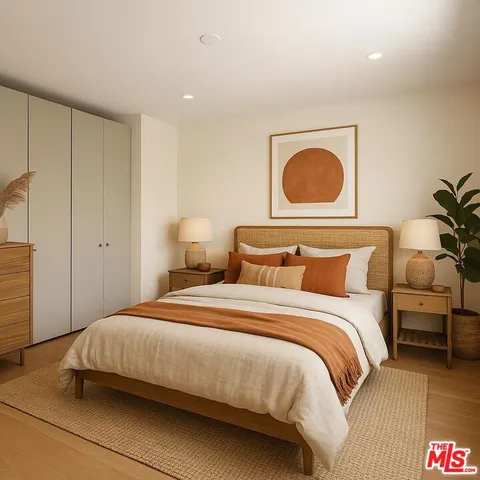 a bedroom with a bed and lamp