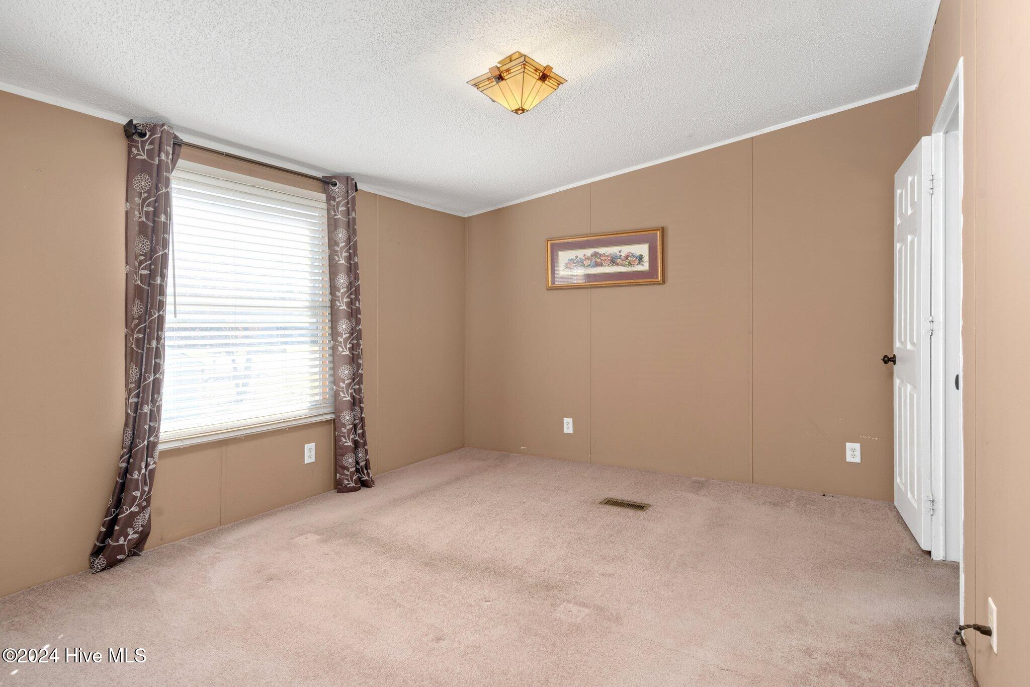 616 St Lewis Road Macclesfield, NC 27852 - Photo 8 of 29 Primary Bedroom