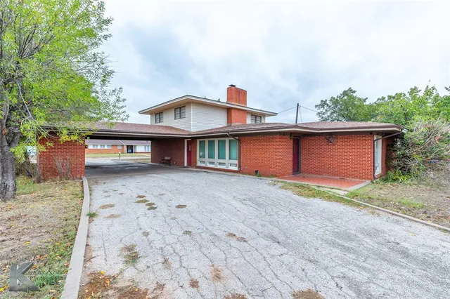 front view of a house with a street